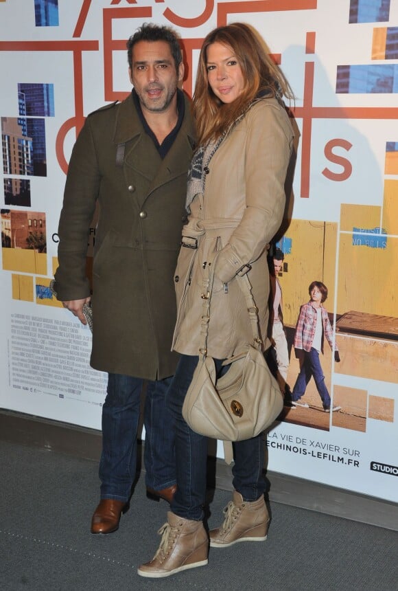 Jean-Pierre Martins et Alexandra Genoves lors de l'avant-première du film "Casse-tête chinois" à Paris, le 25 novembre 2013