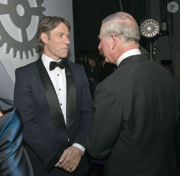 Le prince Charles et le comédien John Bishop lors de la Royal Variety Performance du 25 novembre 2013 au Palladium, à Londres.