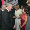 Le prince Charles saluant Flavia Cacace lors de la Royal Variety Performance du 25 novembre 2013 au Palladium, à Londres.