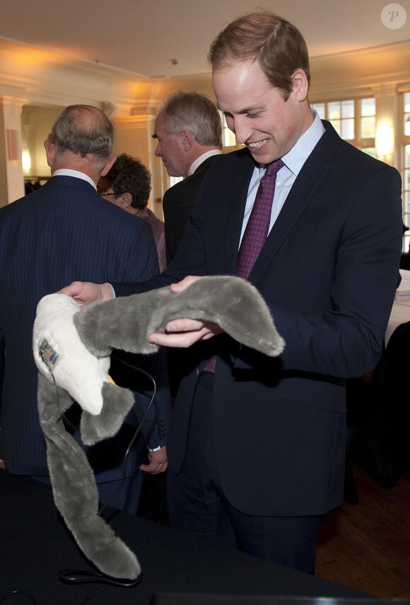 Le prince William et le prince Charles se réunissaient le 26 novembre 2013 à la Société de Zoologie de Londres pour une réunion de l'association United for Wildlife, dont le duc de Cambridge est le président.