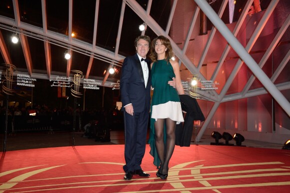Francois Cluzet en compagnie de sa femme Narjiss lors de la soirée d'inauguration du 13e Festival international du film de Marrakech, le 29 novembre 2013.