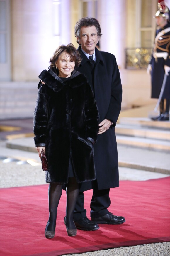 Jack Lang et sa femme Monique lors du dîner du Sommet pour la paix et la sécurité en Afrique au palais de l'Elysée à Paris le 6 décembre 2013