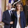 Marie-Charline Pacquot et Pierre Moscovici ministre de l'Economie et des Finances lors du dîner du Sommet pour la paix et la sécurité en Afrique au palais de l'Elysée à Paris le 6 décembre 2013