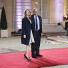 Marie-Charline Pacquot et Pierre Moscovici, ministre de l'Economie et des Finances lors du dîner du Sommet pour la paix et la sécurité en Afrique au palais de l'Elysée à Paris le 6 décembre 2013