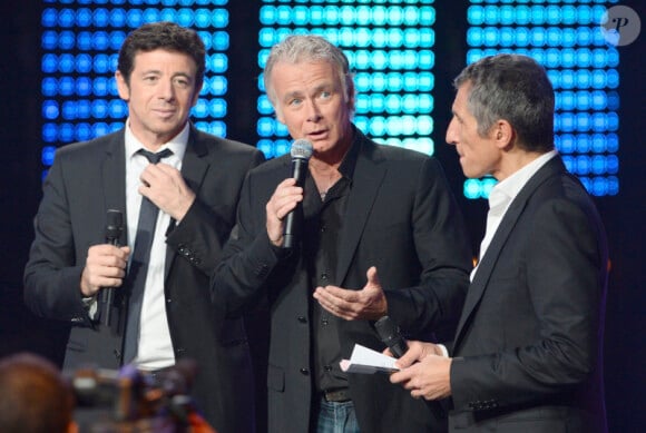 Patrick Bruel, Franck Dubosc et Nagui lors de la soirée spéciale Téléthon sur France 2, le samedi 7 décembre 2013.