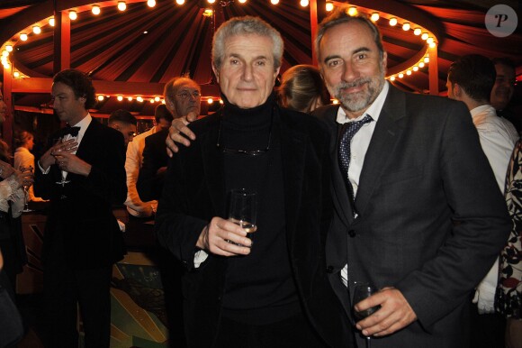 Claude Lelouch et Antoine Duléry lors du gala de la Fondation Mimi (La Baronne Myriam Ullens de Schooten) qui vient en aide aux personnes atteintes d'un cancer, au musée des Arts Forains à Paris, le 30 novembre 2013