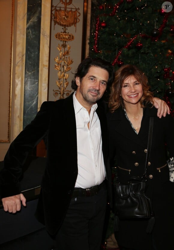 Bruno Madinier et Florence Pernel - 20eme Prix du producteur français de télévision au Théâtre Mogador à Paris, le 9 décembre 2013.