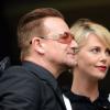 Bono et Charlize Theron lors de l'hommage à Nelson Mandela au Soccer City Stadium à Soweto, le 10 décembre 2013.