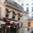 Poppy Montgomery et Shawn Sanford quittent le restaurant La Fontaine de Mars, dans le 7e arrondissement. Paris, le 9 décembre 2013.