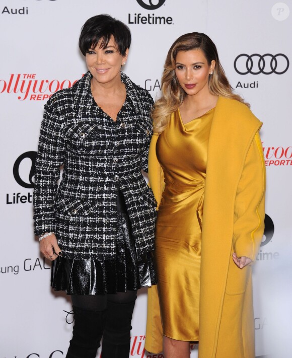 Kris Jenner et sa fille Kim Kardashian lors du 22e déjeuner Women in Entertainment de l'Hollywood Reporter au Beverly Hills Hotel. Beverly Hills, le 11 décembre 2013.