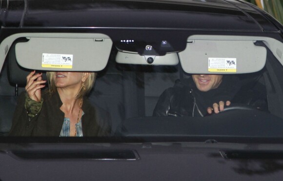 Jennifer Aniston et Justin Theroux quittant la Baby-shower organisée par Emily Blunt, enceinte de son premier enfant, à Los Angeles le 14 décembre 2013