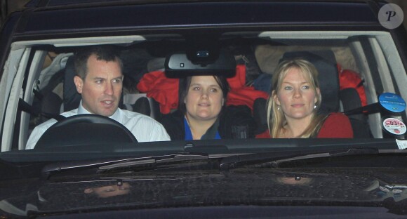 Peter Phillips et Autumn Phillips à Buckingham Palace le 18 décembre 2013 après le déjeuner de Noël en famille offert par la reine Elizabeth II