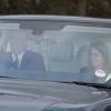 Le prince Andrew, duc d'York, et sa fille la princesse Beatrice arrivant à Buckingham Palace le 18 décembre 2013 pour le déjeuner de Noël en famille offert par la reine Elizabeth II