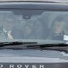 Lady Helen Windsor Taylor et son mari Timothy Taylor arrivant à Buckingham Palace le 18 décembre 2013 pour le déjeuner de Noël en famille offert par la reine Elizabeth II
