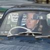 Lord Linley arrivant en Fiat 500 à Buckingham Palace le 18 décembre 2013 pour le déjeuner de Noël en famille offert par la reine Elizabeth II