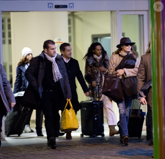 Exclusif - Nicolas Sarkozy et Carla Bruni, accompagnés de Karine Silla, en déplacement à Bruxelles pour le concert de la chanteuse au Cirque Royal, le 13 décembre 2013.