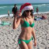 Claudia Romani profite d'une belle après-midi sur une plage de Miami. Le 21 décembre 2013.