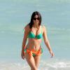Claudia Romani profite d'une belle après-midi sur une plage à Miami. Le 21 décembre 2013.