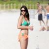Claudia Romani profite d'une belle après-midi sur une plage à Miami. Le 21 décembre 2013.