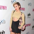 Miley Cyrus assiste au concert Piece of me de Britney Spears, à l'Axis Theater de Las Vegas, le vendredi 27 décembre 2013.