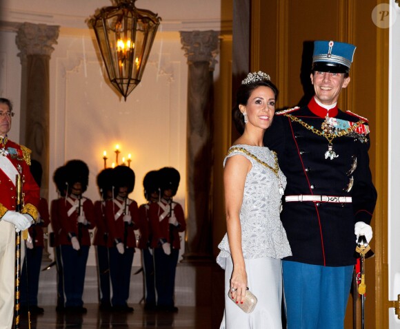 La princesse Marie et le prince Joachim de Danemark au palais Christian VII d'Amalienborg, à Copenhague, le 1er janvier 2014 pour le banquet du Nouvel An offert par la reine Margrethe II.