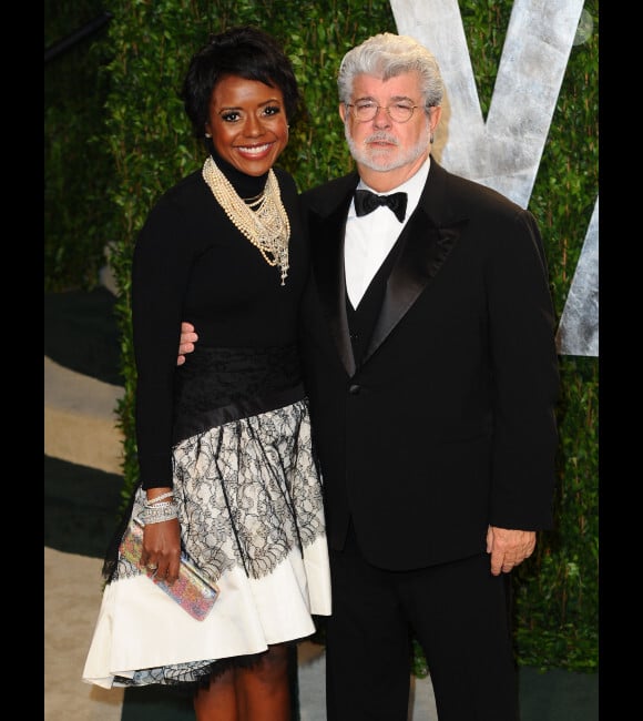 George Lucas et sa femme Mellody Hobson lors de la soirée Vanity Fair post-Oscars le 26 février 2012