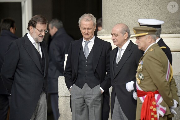 Secondé par la reine Sofia, le prince Felipe et la princesse Letizia, le roi Juan Carlos Ier d'Espagne célébrait le 6 janvier 2014 à Madrid la Pâque militaire, dans un contexte de crise de confiance aggravée vis-à-vis de la monarchie.