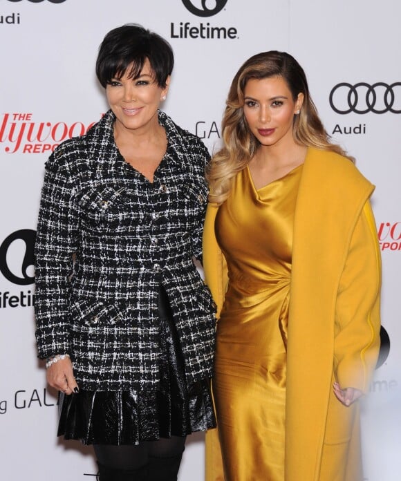 Kris Jenner et sa fille Kim Kardashian posent à l'événement "Women In Entertainment Breakfast" à Beverly Hills le 11 decembre 2013.