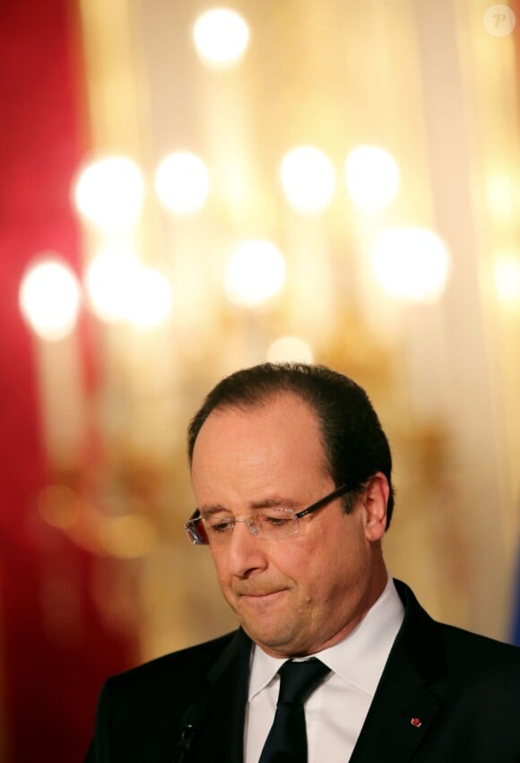 Francois Hollande arrive pour son allocution à l'occasion du lancement des Commémorations du Centenaire de la première Guerre Mondiale, au Palais de l’Élysée, le 7 Novembre 2013.