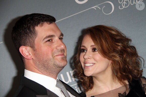 Alyssa Milano et son mari David Bugliari lors du gala UNICEF à Beverly Hills, le 14 janvier 2014.
