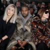 Noomi Rapace, Kanye West et Carine Roitfeld assistent au défilé Givenchy automne-hiver 2014-2015, à la Halle Freyssinet. Paris, le 17 janvier 2014.
