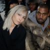 Noomi Rapace et Kanye West assistent au défilé Givenchy automne-hiver 2014-2015, à la Halle Freyssinet. Paris, le 17 janvier 2014.