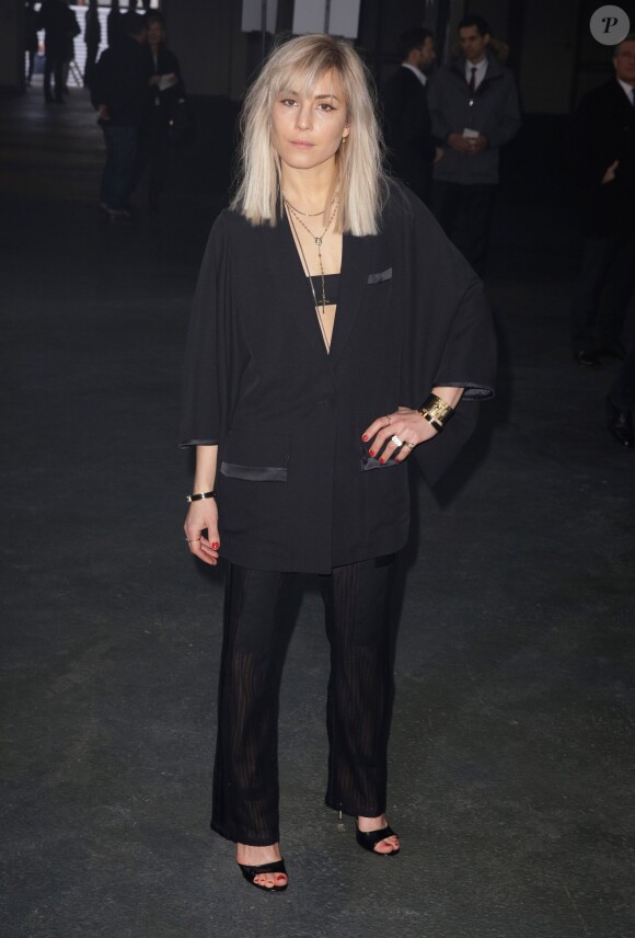 Noomi Rapace arrive à la Halle Freyssinet pour le défilé Givenchy automne-hiver 2014-2015. Paris, le 17 janvier 2014.
