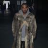 Kanye West arrive à la Halle Freyssinet pour le défilé Givenchy automne-hiver 2014-2015. Paris, le 17 janvier 2014.