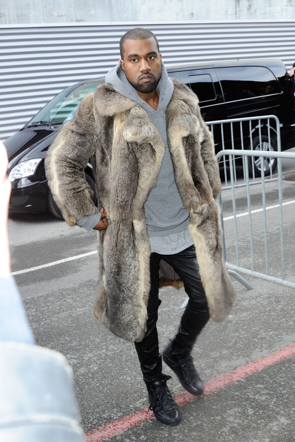 Kanye West arrive à la Halle Freyssinet pour assister au défilé Givenchy automne-hiver 2014-2015. Paris, le 17 janvier 2014.