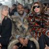 Noomi Rapace, Kanye West et Carine Roitfeld assistent au défilé Givenchy automne-hiver 2014-2015, à la Halle Freyssinet. Paris, le 17 janvier 2014.