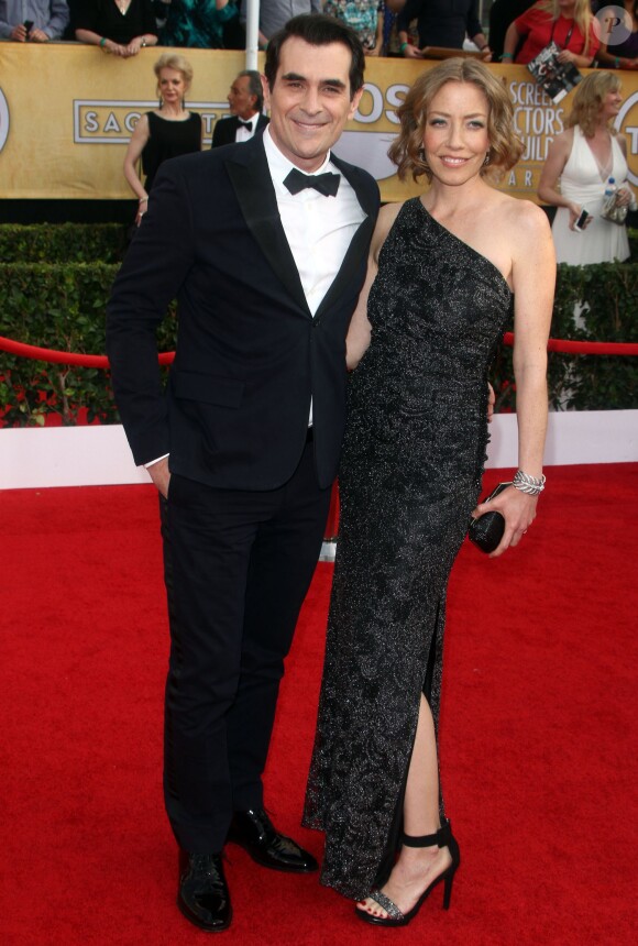 Ty Burrell et sa femme Holly lors de la 20e cérémonie des Screen Actors Guild Awards au Shrine Exposition Center de Los Angeles, le 18 janvier 2014.