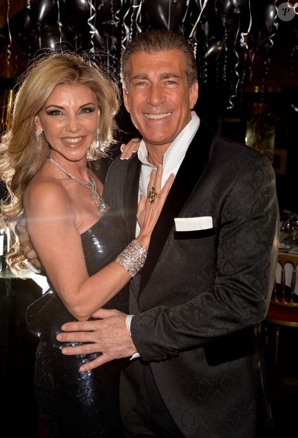 Lisa Tchenguiz et son boyfriend Steve Varsano lors de la fête pour les 49 ans et le divorce de Lisa, au club prisé Annabel's, à Londres, le 17 janvier 2014.