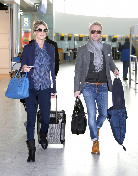 Ronan Keating et sa petite amie Storm Uechtritz à l'aéroport de Londres, le 20 janvier 2014.