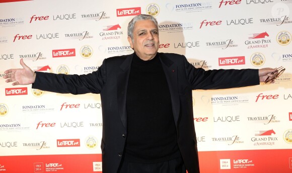 Enrico Macias - Dîner de gala du 93e Grand Prix d'Amerique au Pavillon d'Armenonville, le 25 janvier 2014.