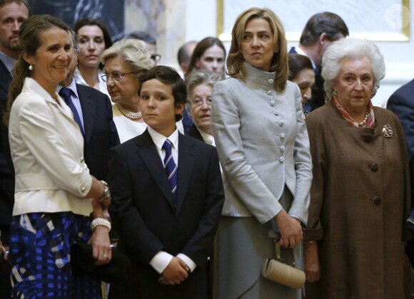 L'infante Elena, son fils Felipe, l'infante Cristina et l'infante Pilar de Bourbon lors d'une messe à Madrid le 20 juin 2013.