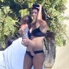 Exclusif - Kourtney Kardashian et sa fille Penelope profitent du soleil dans la villa du producteur Joe Francis. Mexico, le 22 janvier 2014.