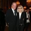 Mireille Darc et son mari Pascal Desprez lors du dîner de gala au profit de la Fondation AVEC au Château de Versailles, le 3 février 2014.