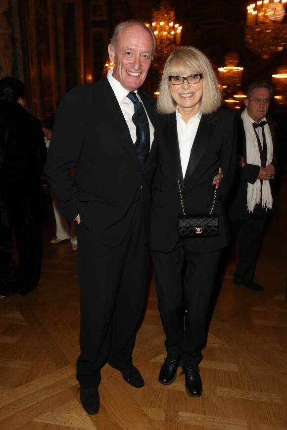 Mireille Darc et son mari Pascal Desprez lors du dîner de gala au profit de la Fondation AVEC au Château de Versailles, le 3 février 2014.