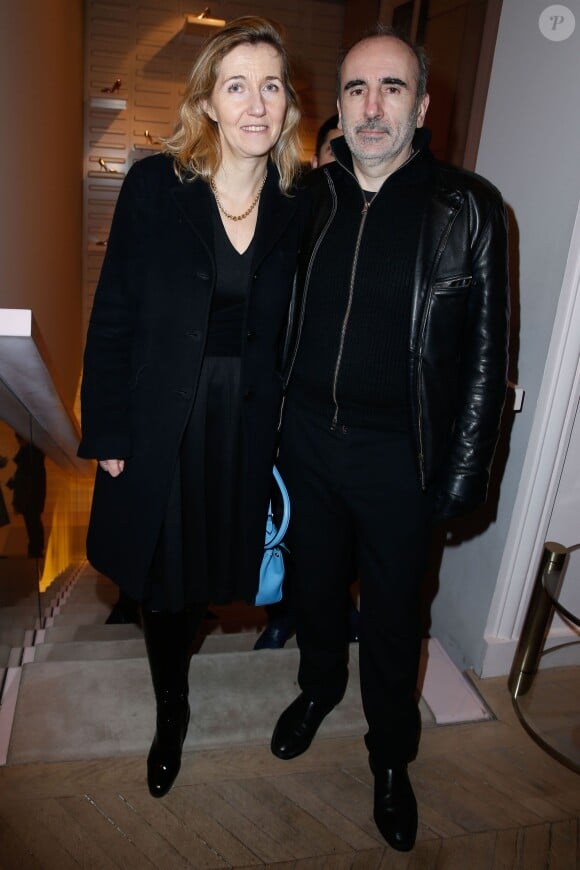 Philippe Harel et sa femme l'écrivain Sylvie Bourgeois lors de la soirée organisée par la Maison Roger Vivier célèbrant la sortie du livre "Le Paris du Tout-Paris" d'Alexandra Senes à Paris, le 4 février 2014.