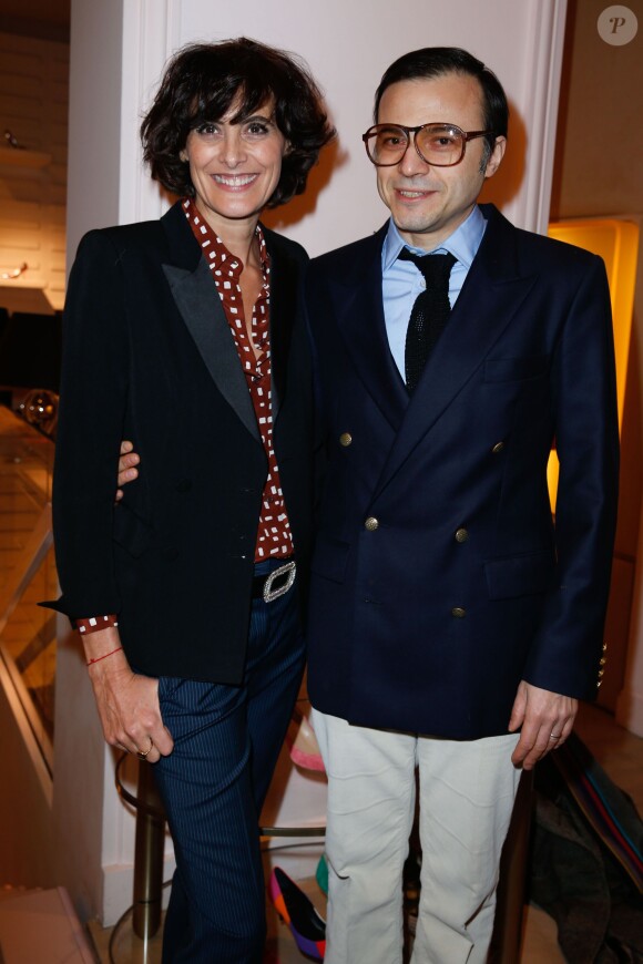 Inès de la Fressange et Bertrand Burgalat lors de la soirée organisée par la Maison Roger Vivier célèbrant la sortie du livre "Le Paris du Tout-Paris" d'Alexandra Senes à Paris, le 4 février 2014.