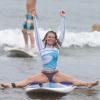 LeAnn Rimes et son mari Eddie Cibrian font du surf et du paddle, à Hawaï, le 3 février 2014.