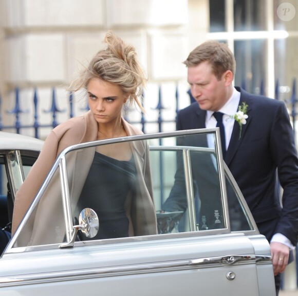 Cara Delevingne et Edward Grant lors du Mariage de Chloe Delevingne et d'Ed Grant à Londres le 7 février 2014.