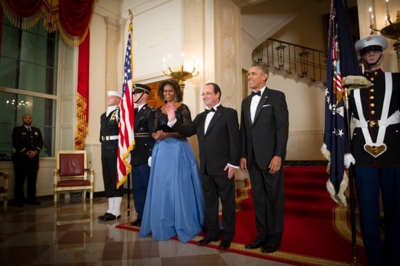 Barack Obama et Michelle Obama avec François Hollande lors du dîner d'Etat organisé à la Maison Blanche à Washington, le 11 février 2014.