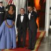 Barack Obama et Michelle Obama prennent la pose avec François Hollande lors du dîner d'Etat organisé à la Maison Blanche à Washington, le 11 février 2014.
